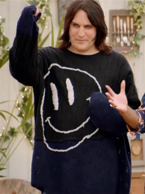 noel fielding smiley face sweater.